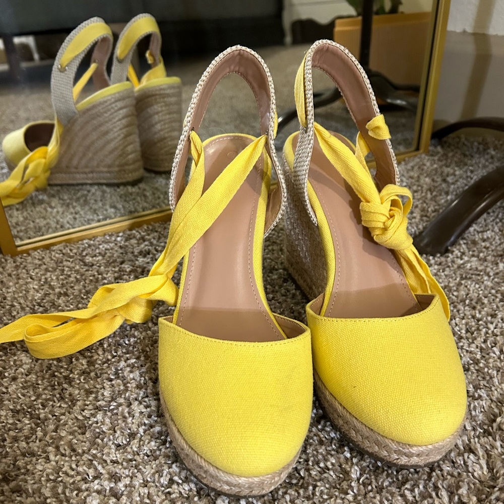 Size 9 sunny yellow espadrilles. 3 inch heel. Worn once.